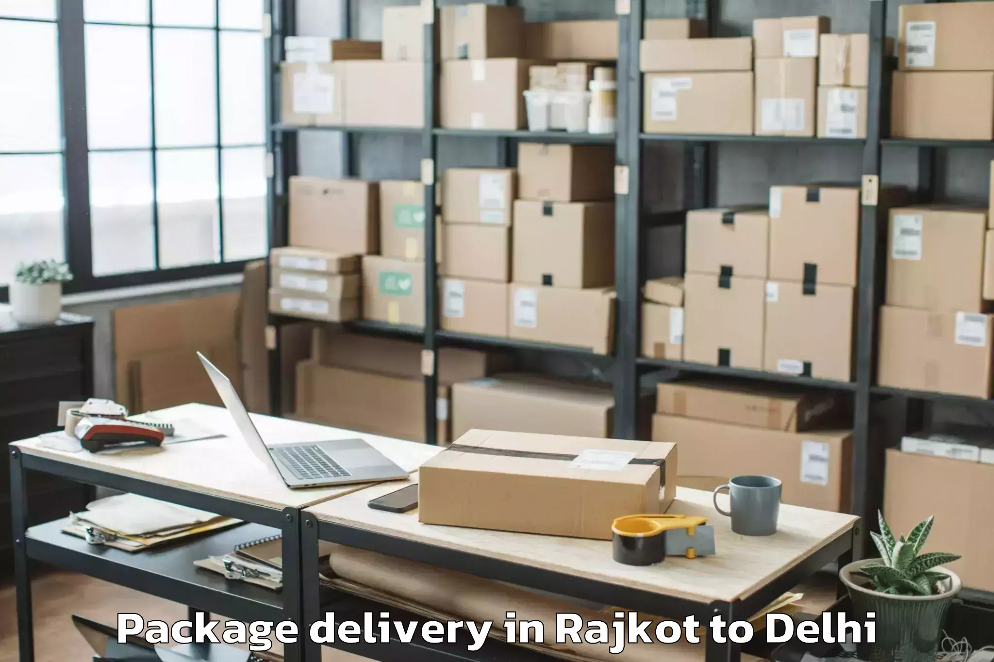 Get Rajkot to Flatted Factory Complex Okhla Package Delivery